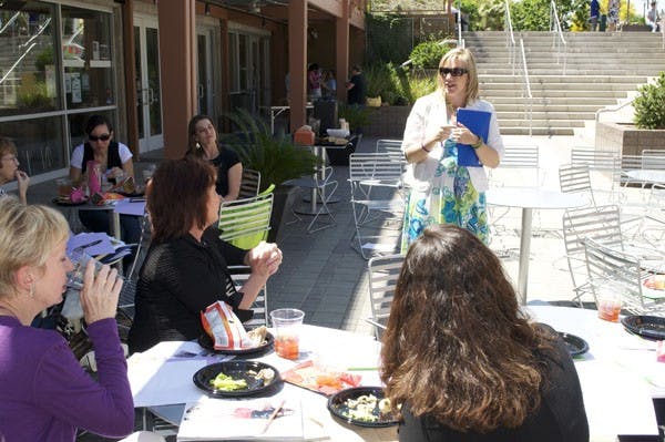 WOMEN'S ISSUES: Donna Bartos, founder of the Purple Ribbon Council, which aims to stop domestic abuse, leads attendees of the Female Contemporary Issues Summit in an activity which identified their goals in life and the thins that held them back from achieving those. She also spoke about her own experiences with domestic violence and her journey in founding the Council. (Photo by Molly Smith)