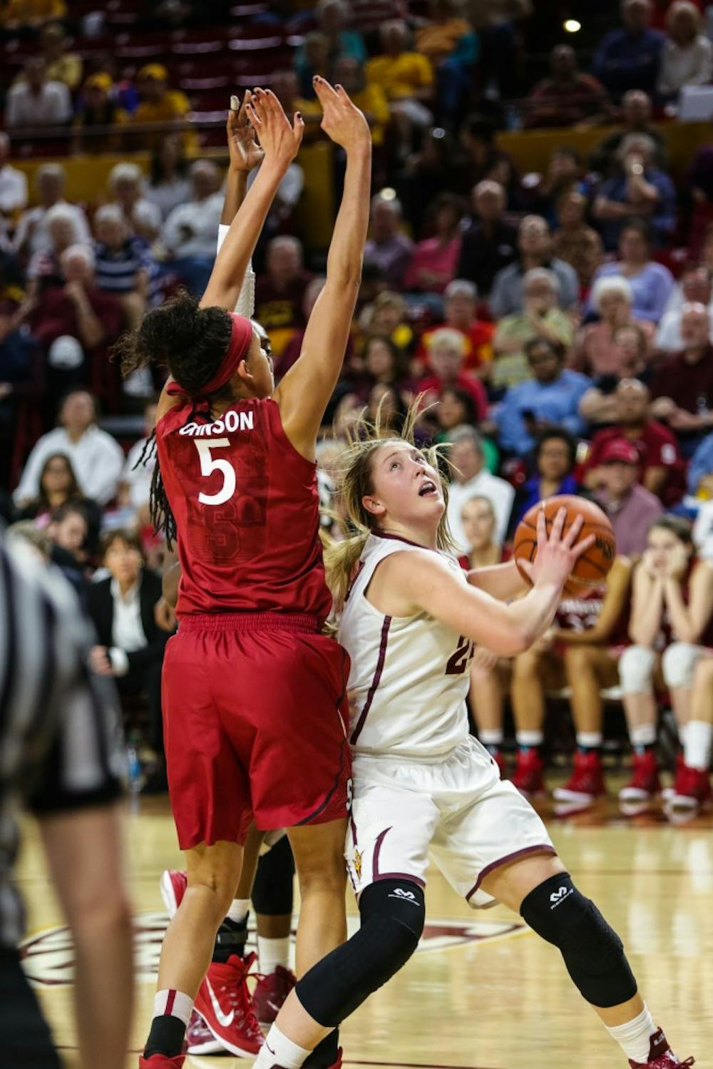 ASU sophomore forward Kelsey Moos looks for a shot as Stanford freshman forward Kaylee Johnson closes during the ASU vs. Stanford women’s basketball game on Feb. 6, 2015, at the Wells Fargo Arena. (Daniel Kwon/The State Press)