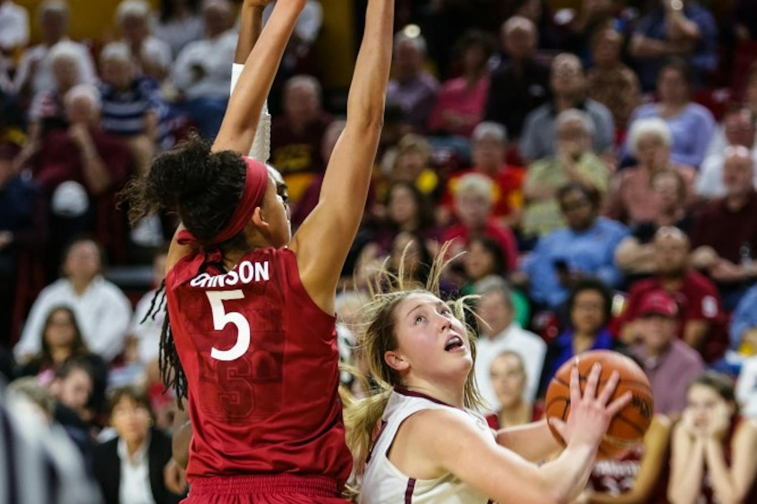 ASU sophomore forward Kelsey Moos looks for a shot as Stanford freshman forward Kaylee Johnson closes during the ASU vs. Stanford women’s basketball game on Feb. 6, 2015, at the Wells Fargo Arena. (Daniel Kwon/The State Press)