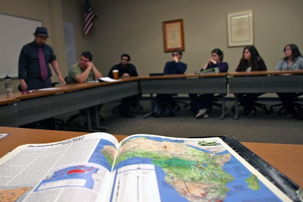 EGYPTIAN EVENTS: Dr. David Pickus holds a discussion with various students about the long-term effects of the current turmoil in Egypt. (Photo by Rosie Gochnour)