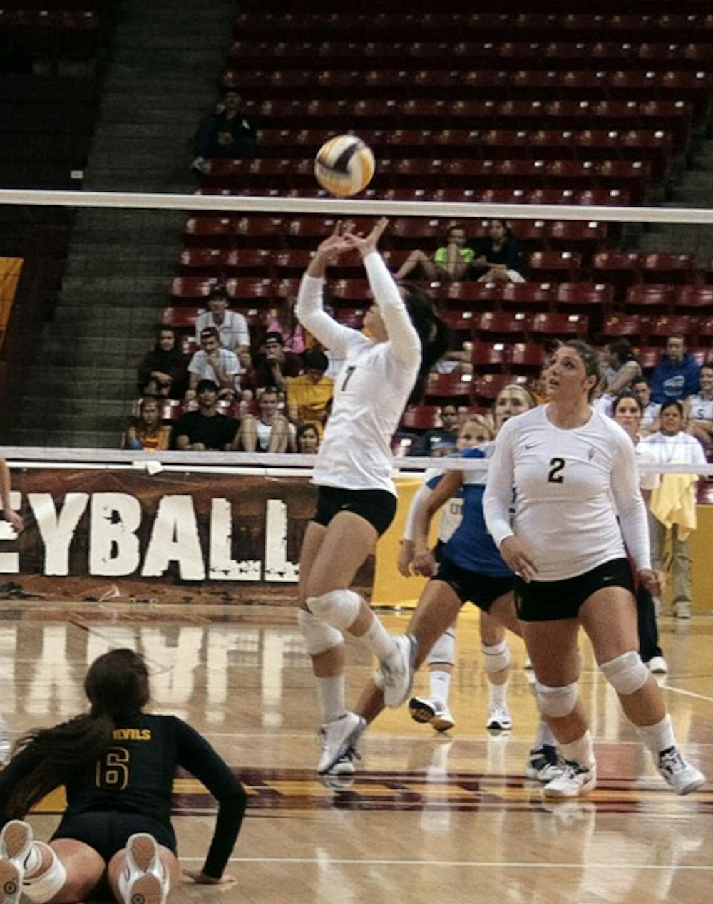 Senior setter Shannan McCready sets the ball in a home game in the 2011 season. (Photo by Michaela Mader)