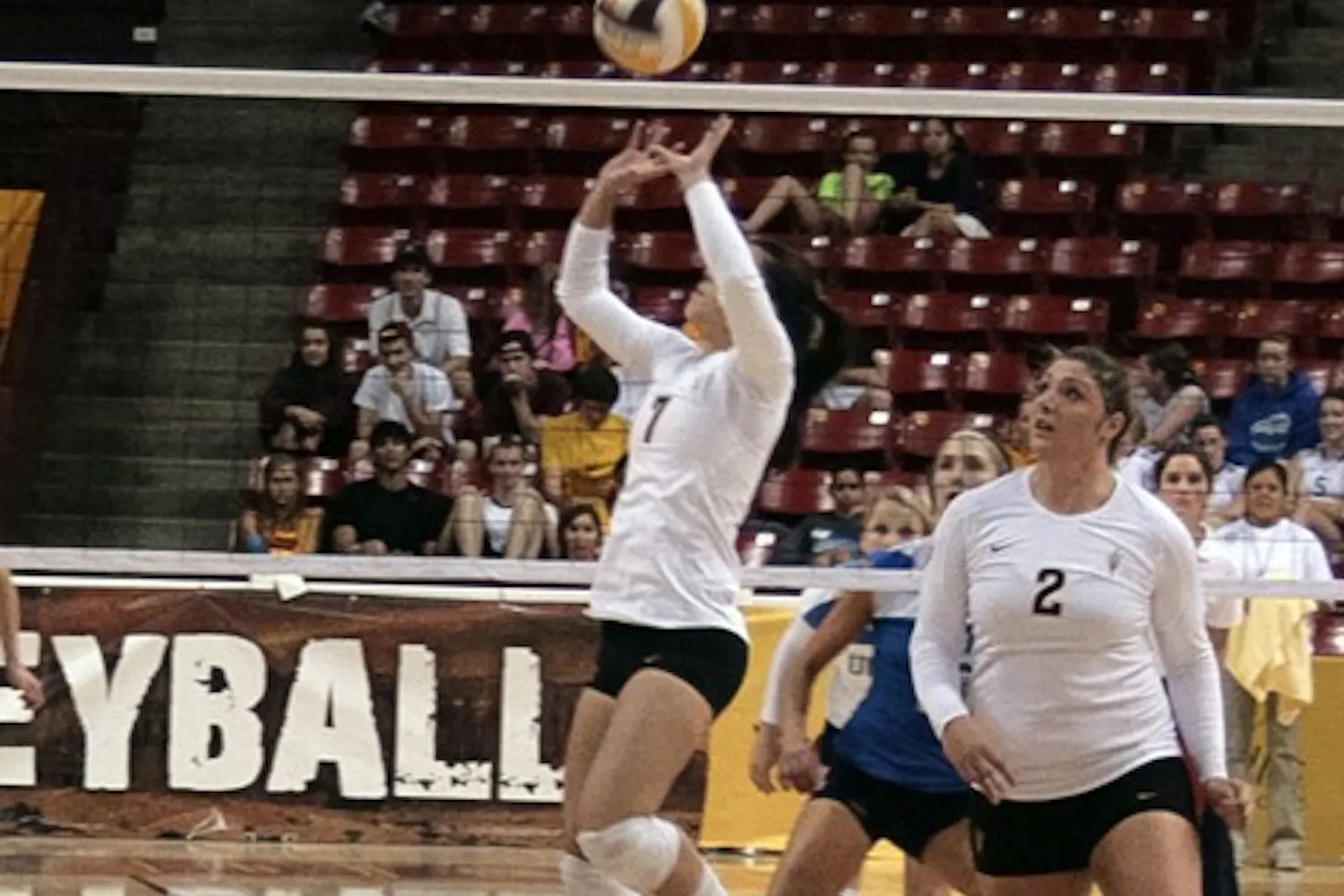 Senior setter Shannan McCready sets the ball in a home game in the 2011 season. (Photo by Michaela Mader)