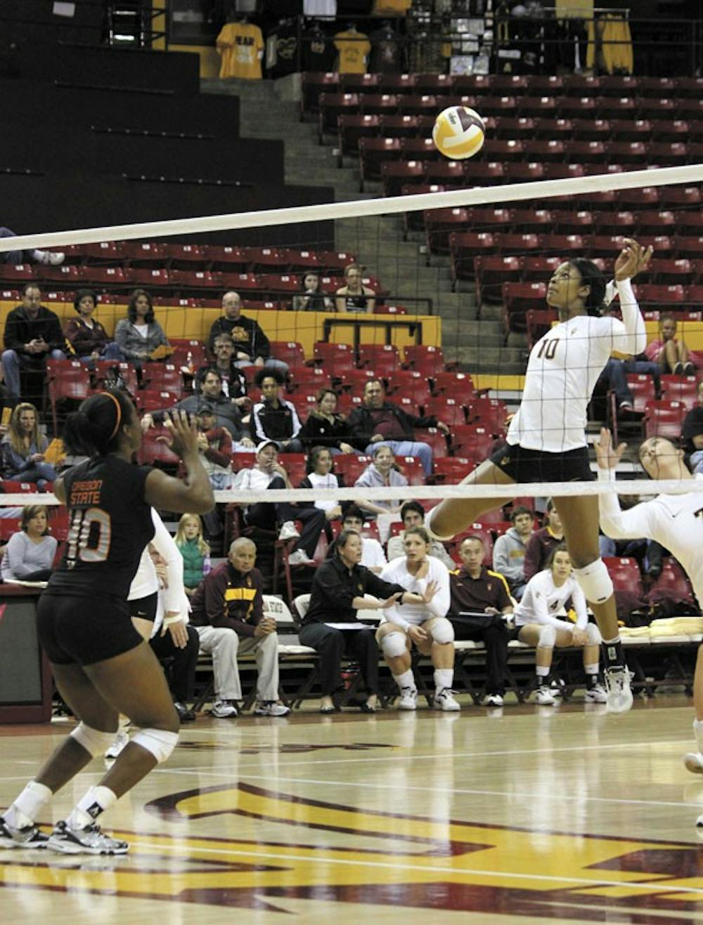 Senior middle blocker Erica Wilson (10) jumps to spike the ball in a game against Oregon State last year. The Sun Devils won their first three games at the El Paso Sports Commission Invitational last weekend, their best start since 2006.  (Photo by Sam Rosenbaum) 
