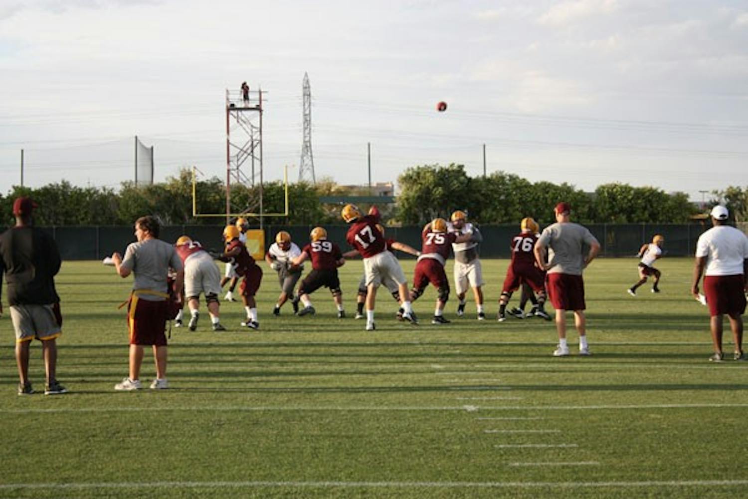 AIR IT OUT: ASU sophomore quarterback Brock Osweiler throws a pass during the Sun Devils’ spring practice on Wednesday. Osweiler will battle junior Steven Threet for the starting job in 2010. (Photo by Kyle Thompson)