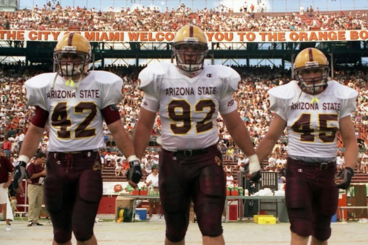 Pat Tillman (left) walks out for a pre-game coin toss. Tillman will be honored Saturday during the eighth annual Pat’s Run. (Photo courtesy of Sun Devil Athletics Media Relations)