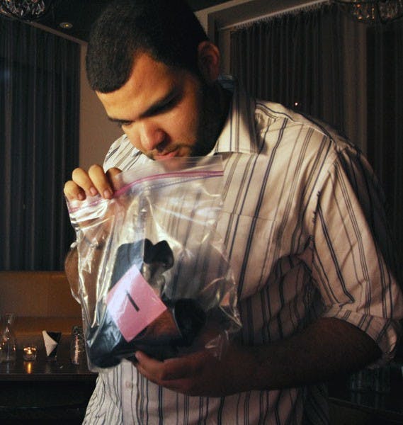 Victor Jackson smells a shirt in hopes of meeting "the one." (Photo by Jenn Allen)