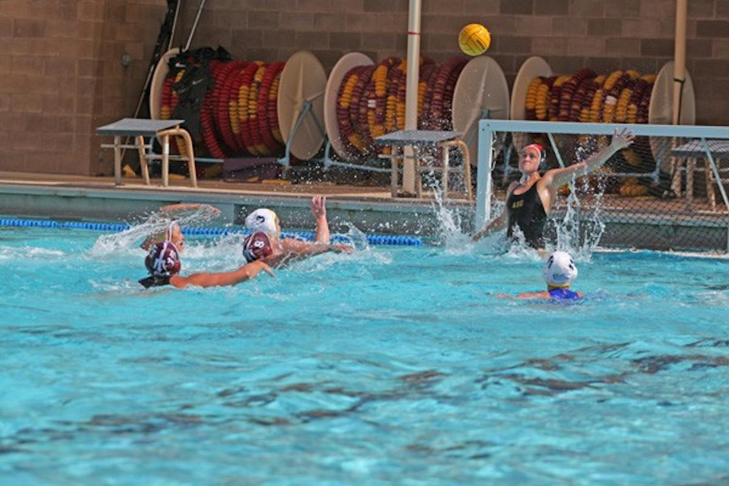 Ranked showdown: ASU freshman goalie Ianeta Hutchinson reaches for the airborne ball during the No. 11 Sun Devils’ 16-7 win over Cal Baptist on March 5. The team heads to No. 5 Hawaii for another shot at breaking its conference losing streak. (Photo by Beth Easterbrook)