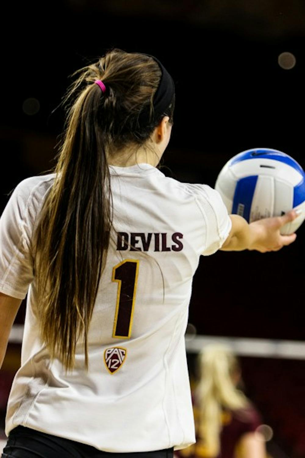 Junior setter Bianca Arellano serves the ball during the ASU vs Colorado volleyball game at the Wells Fargo Arena on Nov. 2, 2014. Arellano has been a key player for the Sun Devils with 17 double doubles this season. (Photo by Daniel Kwon)