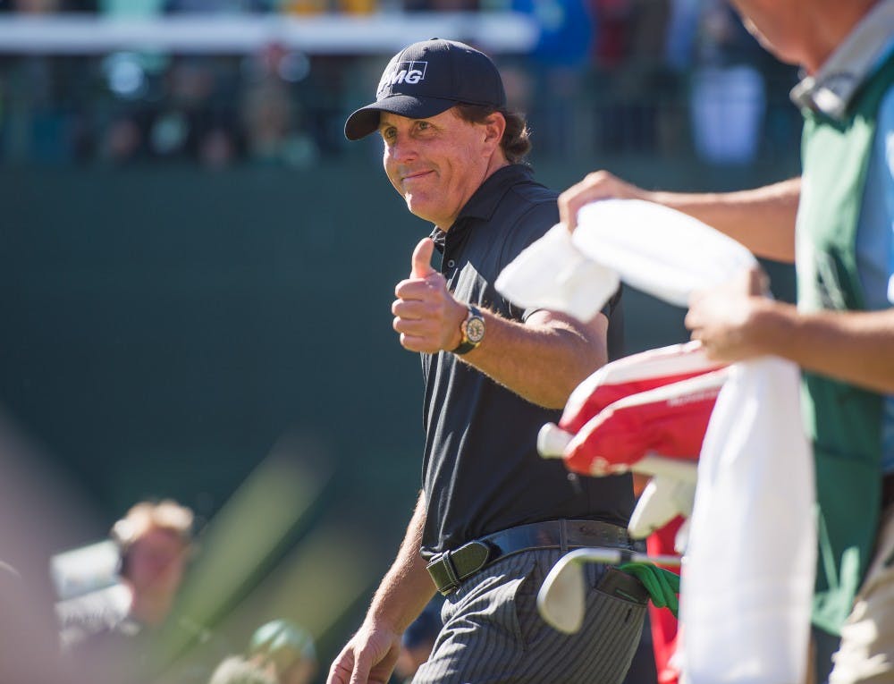 Phil Mickelson gives the thumbs-up to fans after teeing off at the 16th hole of the Waste Management Phoenix Open on Saturday, Feb. 6, 2016, at TPC Scottsdale.