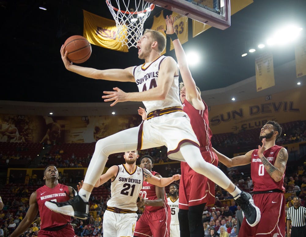 Sophomore guard Kodi Justice makes a layup against Washington State on Thursday, Jan. 14, 2016, at Wells Fargo Arena in Tempe. The Sun Devils defeated the Cougars 84-73.