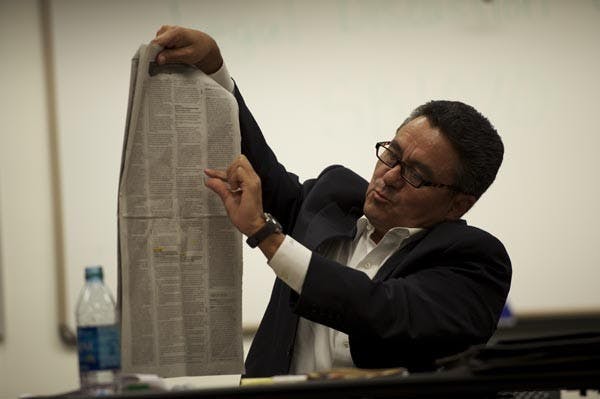 SB 1070 PANEL: Daniel Ortega Jr. takes aim at the legal issues raised by SB 1070 during a discussion panel on the bill''s legal implications. Ortega was joined by Professor Cathy O'Grady and Dan Pochoda in the Sandra Day O'Conner School of Law. (Photo by Michael Arellano)