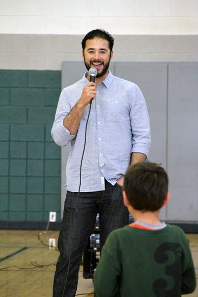 Former ASU baseball player Andre Ethier talks to children at the Chandler/Gilbert Family YMCA Saturday afternoon. (Photo by Diana Lustig)