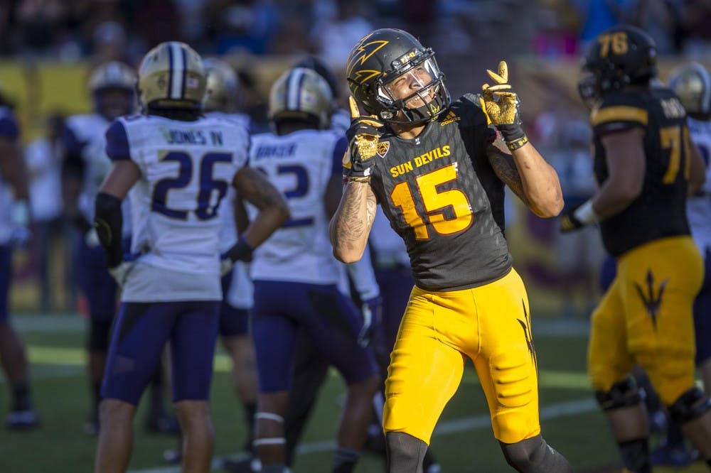 Redshirt senior wide receiver Devin Lucien celebrates after scoring a touchdown in the second half of a game on Saturday, Nov. 14, 2015, at Sun Devil Stadium in Tempe, Ariz. ASU came back in the second half to win the game 27-17.