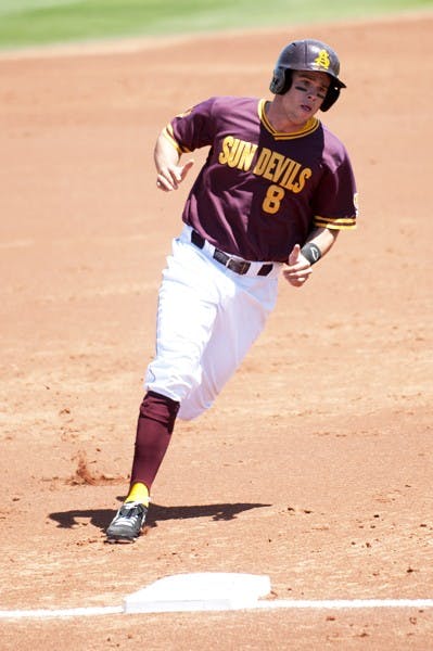 Junior outfielder Kasey Coffman rounds third and heads for home against Valparaiso on April 21, 2013. Coffman started off ASU's victory over Utah with double on Saturday, April 27. (Photo by Molly J. Smith)
