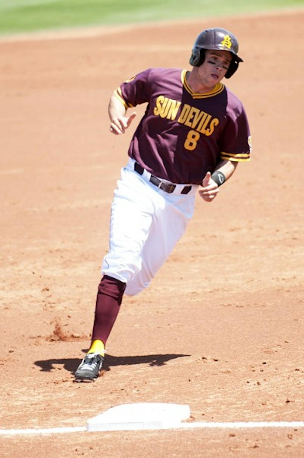 Junior outfielder Kasey Coffman rounds third and heads for home against Valparaiso on April 21, 2013. Coffman started off ASU's victory over Utah with double on Saturday, April 27. (Photo by Molly J. Smith)