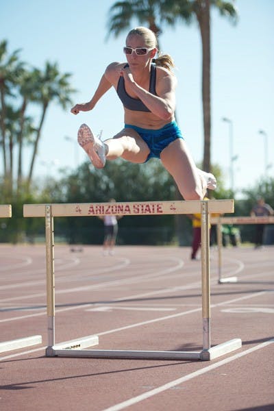Final shot: ASU senior Samantha Henderson clears a hurdle during practice earlier in the season. The Sun Devils who haven’t qualified for the indoor national championships yet will get one more attempt at the Last Chance Meet in Iowa. (Photo by Michael Arellano)