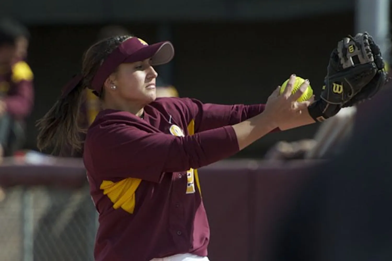 ARMED AND READY: ASU freshman Sam Parlich gets ready to throw a pitch during the Sun Devils’ 14-0 victory against Rutgers on Feb. 21. The Sun Devils won three games in the Judi Garman Classic in Fullerton, Calif. over the weekend. (Photo by Michael Arellano)