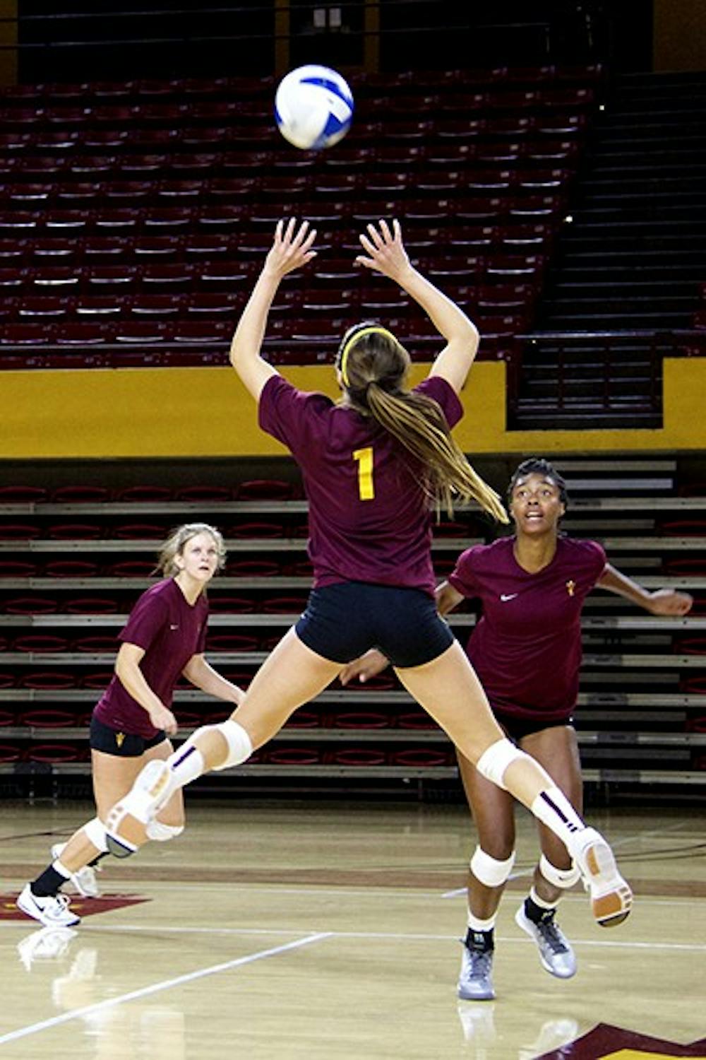 Junior setter Bianca Arellano sets the ball for her teammates during the ASU Girl’s Volleyball Maroon and Gold Scrimmage on Aug. 23 at Wells Fargo Arena. (Photo by Becca Smouse)