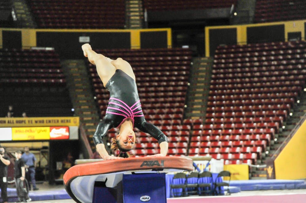 Senior Allie Salas springs off the vault at the match-up between the Sun Devils and the California Golden Bears on Monday, February 15, 2016 at Wells Fargo Arena in Tempe, Ariz.