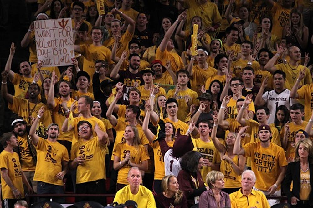 Sparky leads ASU students in a cheer at a men's basketball game on Feb. 14 against UA. (Photo by Alexis Macklin)