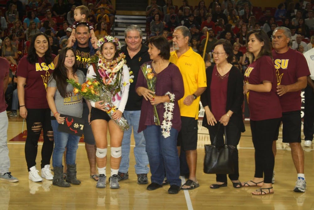 Setter Shannan McCready is recognized on Senior Night with her family at Wells Fargo Arena prior to the game against UA on Friday, Nov 28, 2014. (Photo by Logan Newman)