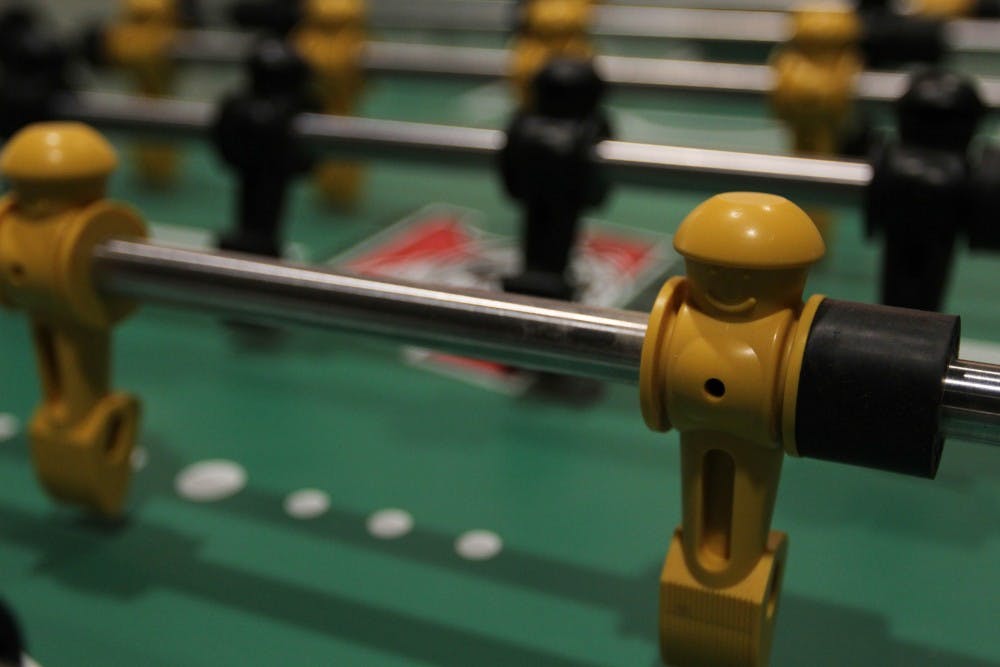 Fully renovated recreation rooms house foosball tables, billiards as well as card tables. The 1st floor of Manzanita also has study rooms and booths for residents. (photo by Dominic Valente) 