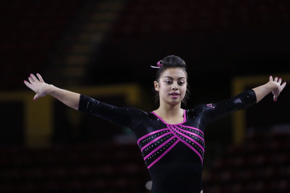 ASU sophomore Katelyn Lentz performs on the beam in a gymnastics meet against Stanford at the Wells Fargo Arena in Tempe, Ariz. on Saturday Feb. 18, 2017. Stanford posted a 195.200 - 195.775 victory over ASU.