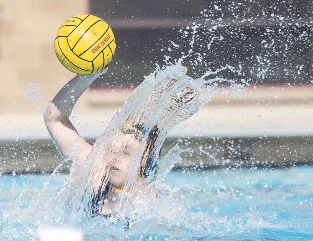 Sun Devil attacker Lena Mihailovic prepares to pass the ball during a game against the Indiana University Hoosiers at Mona Plummer Aquatic Center in Tempe, Ariz., on Sunday, Jan. 24, 2015. The Sun Devils won the game with a final score of 23-4. 