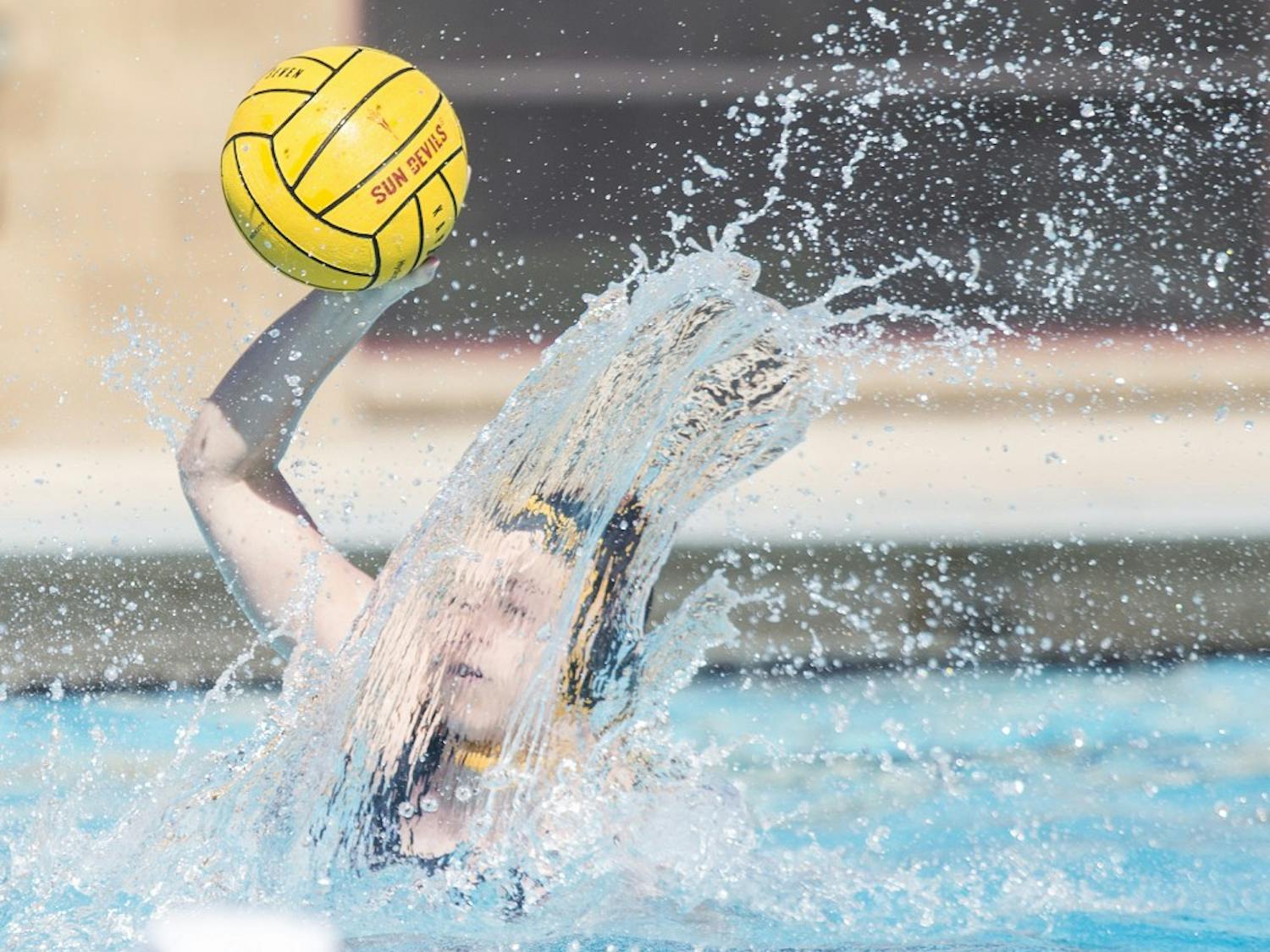 Sun Devil attacker Lena Mihailovic prepares to pass the ball during a game against the Indiana University Hoosiers at Mona Plummer Aquatic Center in Tempe, Ariz., on Sunday, Jan. 24, 2015. The Sun Devils won the game with a final score of 23-4. 