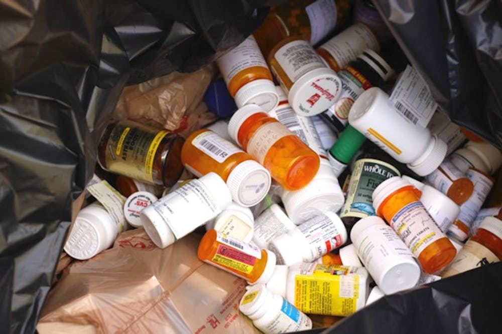 GIVING BACK: ASU's wellness department and police department were at Tuesday's Farmer's Market on the Tempe campus to collect and dispose of old medication safely. (Photo by Lillian Reid)