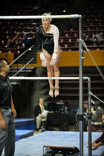 Sophomore all-around Beka Conrad performs a routine on Jan. 9, 2015 at Sun Devil Stadium. (Photo by Andrew Ybanez)