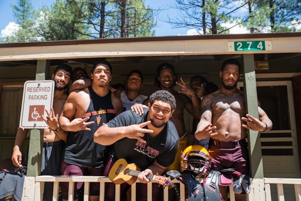 Mo Latu and his fellow musicians are pictured at their cabin at Camp Tontozona. (Photo by Andrew Ybanez)