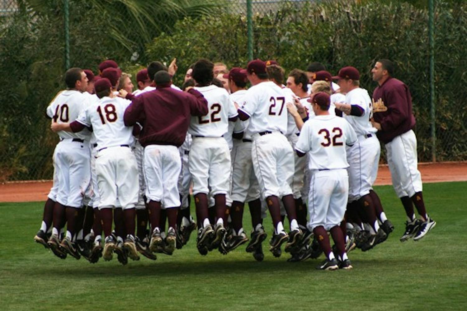 The ASU baseball team rallies together before a game against New Mexico on Feb. 20, 2011. The Sun Devils' goal is to be the No. 1 team in the country although they cannot go to the postseason. (Photo by Lisa Bartoli)