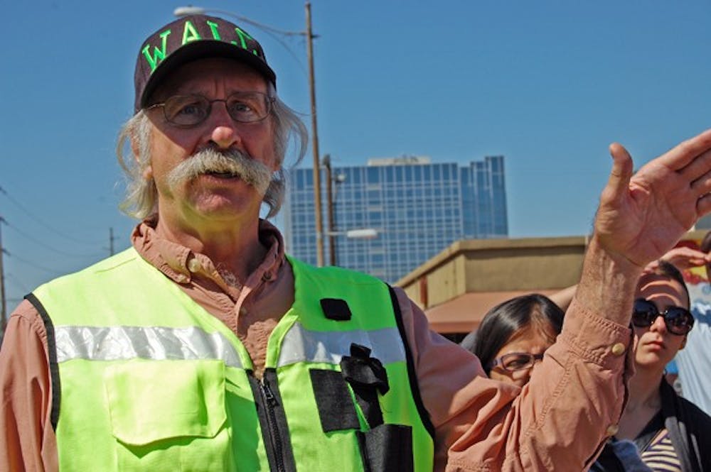 Dan Burden, executive director and co-founder of Walkable and Livable Communities, took Valley residents around downtown Phoenix to educate them about making Phoenix a more walkable city. (Photo by Thania A. Betancourt)