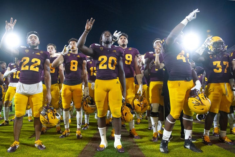 ASU's football team celebrates a win after its home opening game against Kent State on Thursday, Aug. 29, 2019, at Sun Devil Stadium in Tempe, Arizona. ASU won 30-7.
