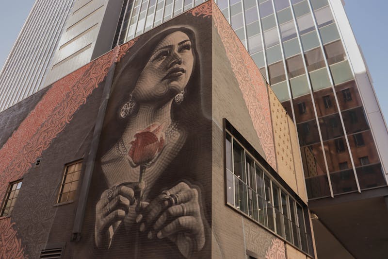 Mural by Miles "El Mac" MacGregor and Thomas "Breeze" Marcus on the corner of Monroe Street and First Avenue on Monday, Oct. 7, 2024, in Phoenix.