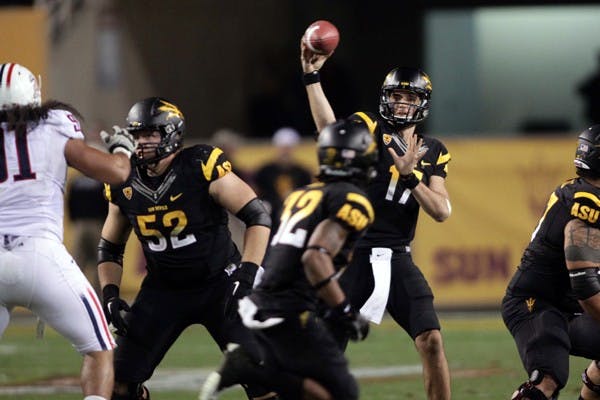 ASU junior quarterback Brock Osweiler throws downfield during the Sun Devils' loss to UA in November. ASU faces a tough Boise State team in Las Vegas on Dec. 22.(Photo by Beth Easterbrook)