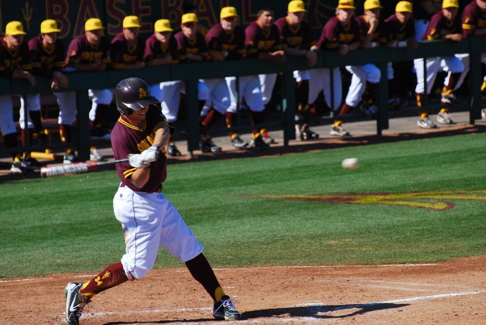 Junior infielder Michael Benjamin takes a swing during the Feb. 16 match against Bethune Cookmam. The Sun Devils won, 15- 7. (Photo by Murphy Bannerman)