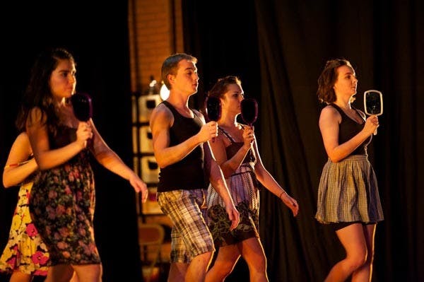 DANCING GRADS: Dancers perform "The Body Electric,” choreographed by Inertia DeWitt, a graduate student in the Herberger Institute for Design and the Arts. The performance was part of the Graduate Project Presentations dance performance held on Tempe campus Wednesday evening. (Photo by Michael Arellano)