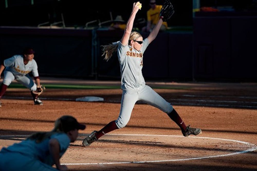 Senior righthanded pitcher Mackenzie Popescue winds up to release the ball. ASU beat Utah 4-3 on Friday, April 11, 2014. (Photo by Mario Mendez)