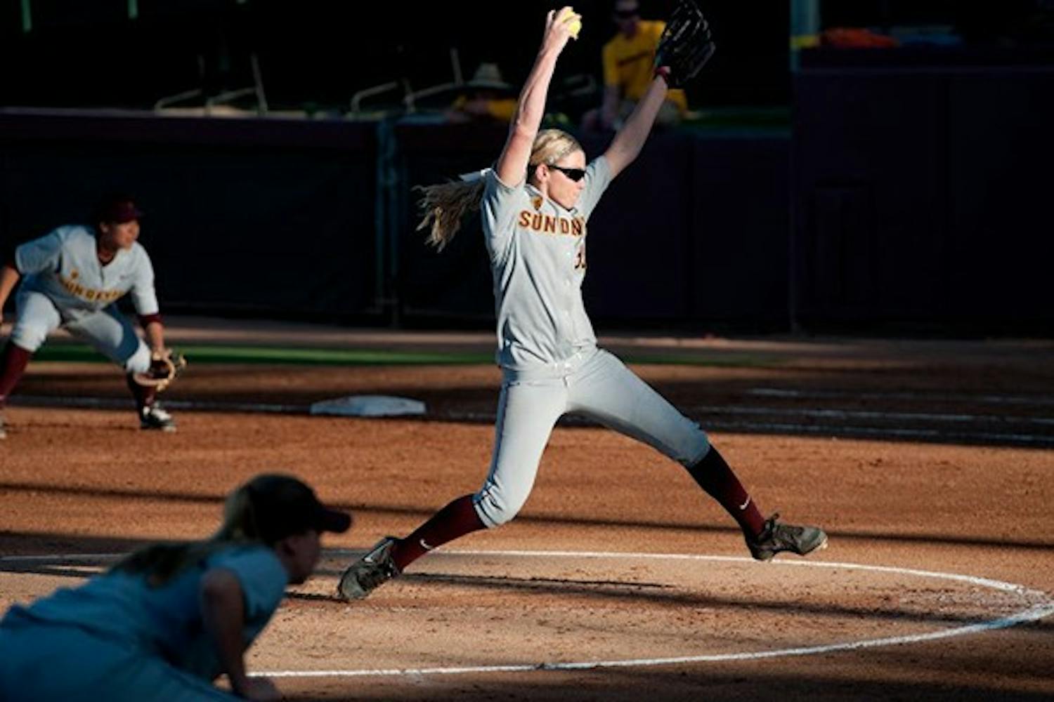 Senior righthanded pitcher Mackenzie Popescue winds up to release the ball. ASU beat Utah 4-3 on Friday, April 11, 2014. (Photo by Mario Mendez)