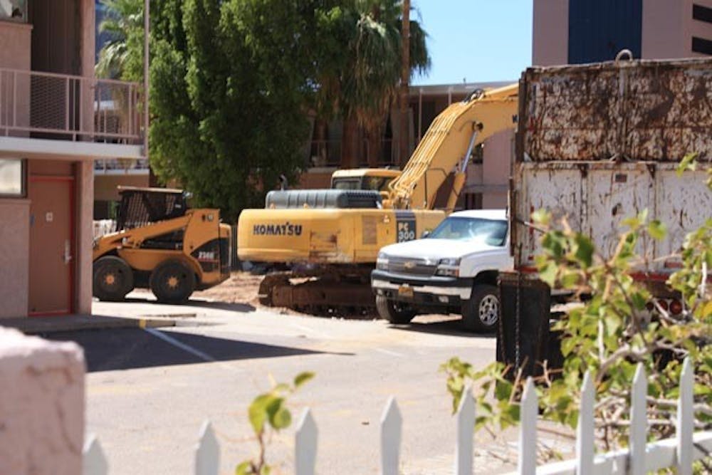 MAKING WAY: Demolition began today on the vacant Ramada Inn near the downtown campus. This soon to be vacant spot maybe the future sight of a new College of Law in years to come. (Photo by Jessica Weisel)