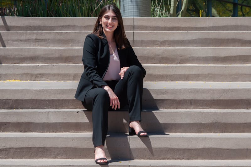 Alexia Childress, co-president of the National Pre-Health Conference, poses for a portrait on the steps of the Biodesign Institute Building on the ASU Tempe campus on Monday, April 19, 2021.&nbsp;