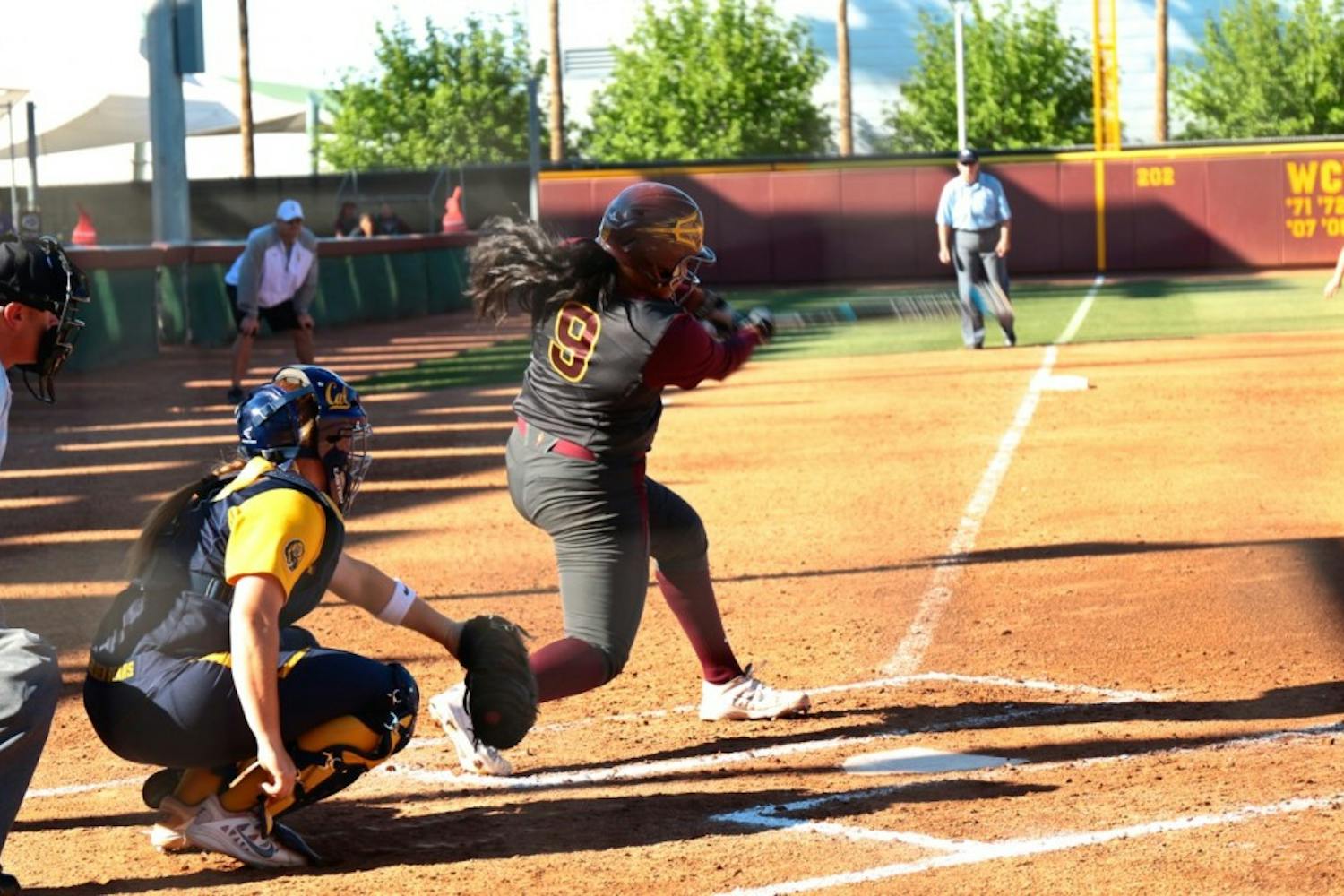 Senior designated player Amber Freeman hits a double in a game against Cal on Saturday, March 21, 2015 at Farrington Softball Stadium in Tempe. The Sun Devils defeated the Golden Bears 6-5. (Kat Simonovic/The State Press)