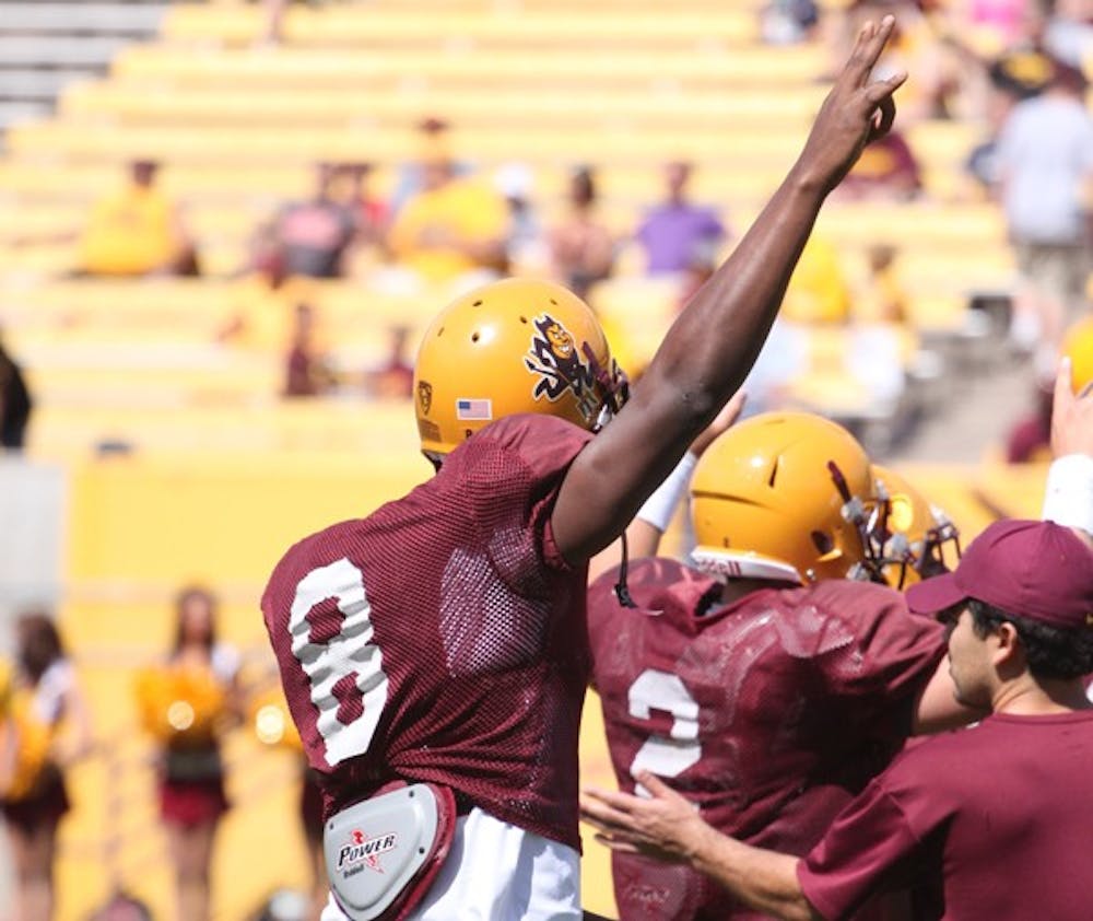 BIG RETURN: ASU senior Gerell Robinson makes the pitchfork sign during the spring game on April 23. Robinson expects to make a big impact on the field this year after suffering a minor knee injury in early August. (Photo by Beth Easterbrook)