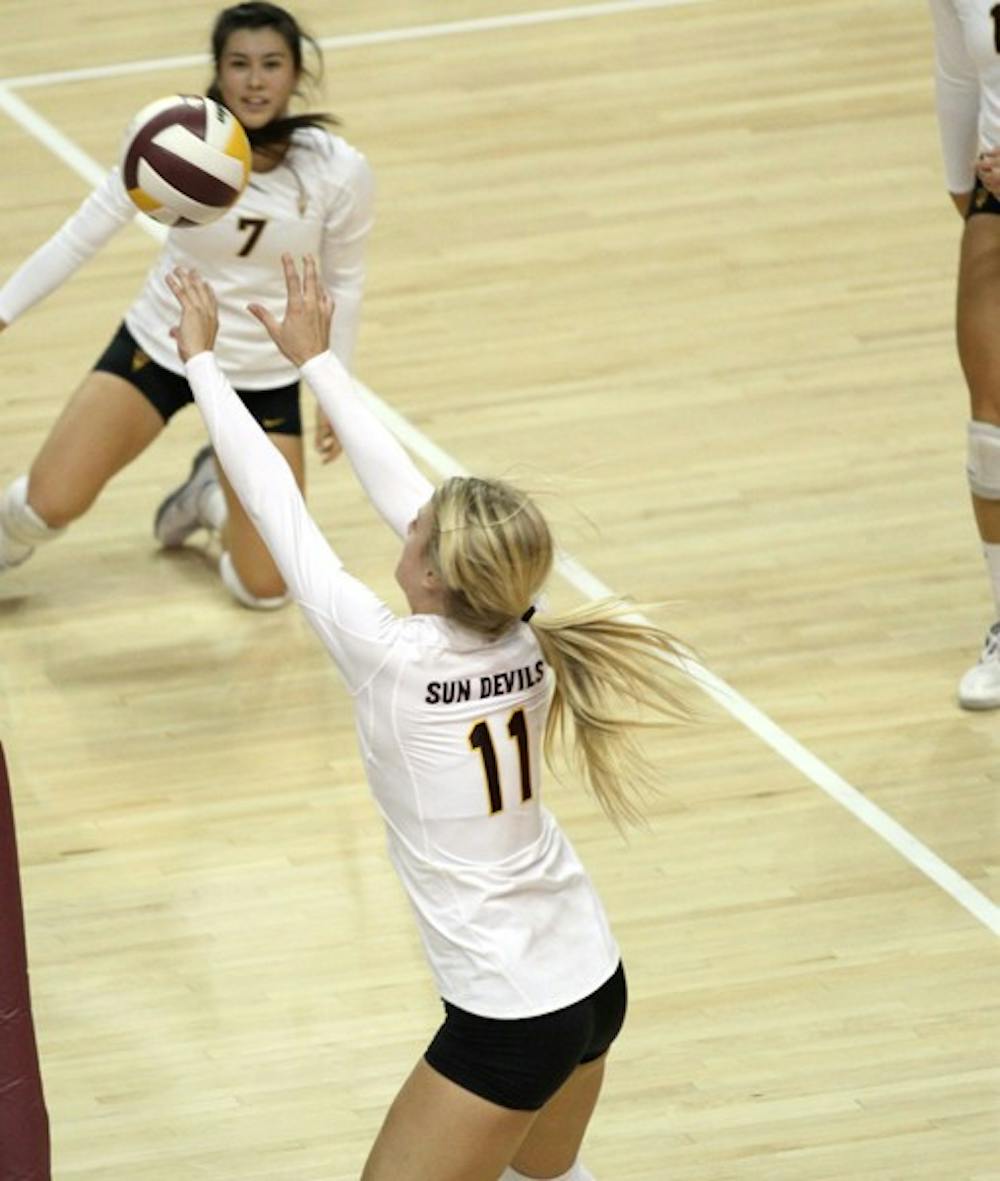LOOKING UP: Junior outside hitter Sarah Clause raises the ball up during the Sun Devils’ 3-0 loss to then-No. 4 Washington on Sept. 23. The Sun Devils host No. 2 UCLA and No. 5 USC this weekend at Wells Fargo Arena after upsetting both teams last year. (Photo by Lisa Bartoli)