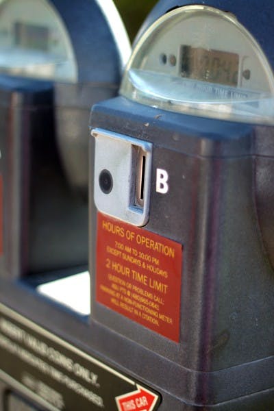 House Bill 2086 would require that cities regularly check on and maintain parking meters like this one on Gammage Parkway and South Forest Avenue to ensure they are functioning properly. Rep. Chad Campbell, D-Phoenix, authored the bill in frustration after parking meters in downtown Phoenix stole his change. (Photo by Ashley Kesweder)