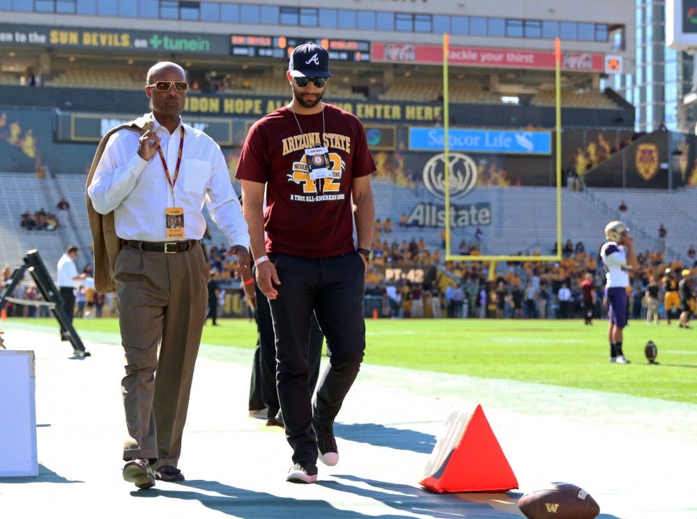 ASU athletic director Ray Anderson walks the sidelines of Frank Kush Field at Sun Devil Stadium prior to the Sun Devils' game against Washington on Nov. 14, 2015.
