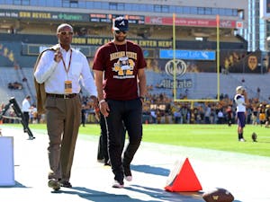 ASU athletic director Ray Anderson walks the sidelines of Frank Kush Field at Sun Devil Stadium prior to the Sun Devils' game against Washington on Nov. 14, 2015.