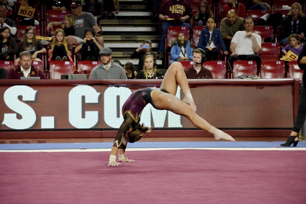 ASU junior Stephanie Miceli performs her floor exercise routine against Stanford on Saturday Jan. 31, 2015, at Wells Fargo Arena in Tempe. Miceli finished her routine with a score of 9.725. (Krista Tillman/ The State Press)